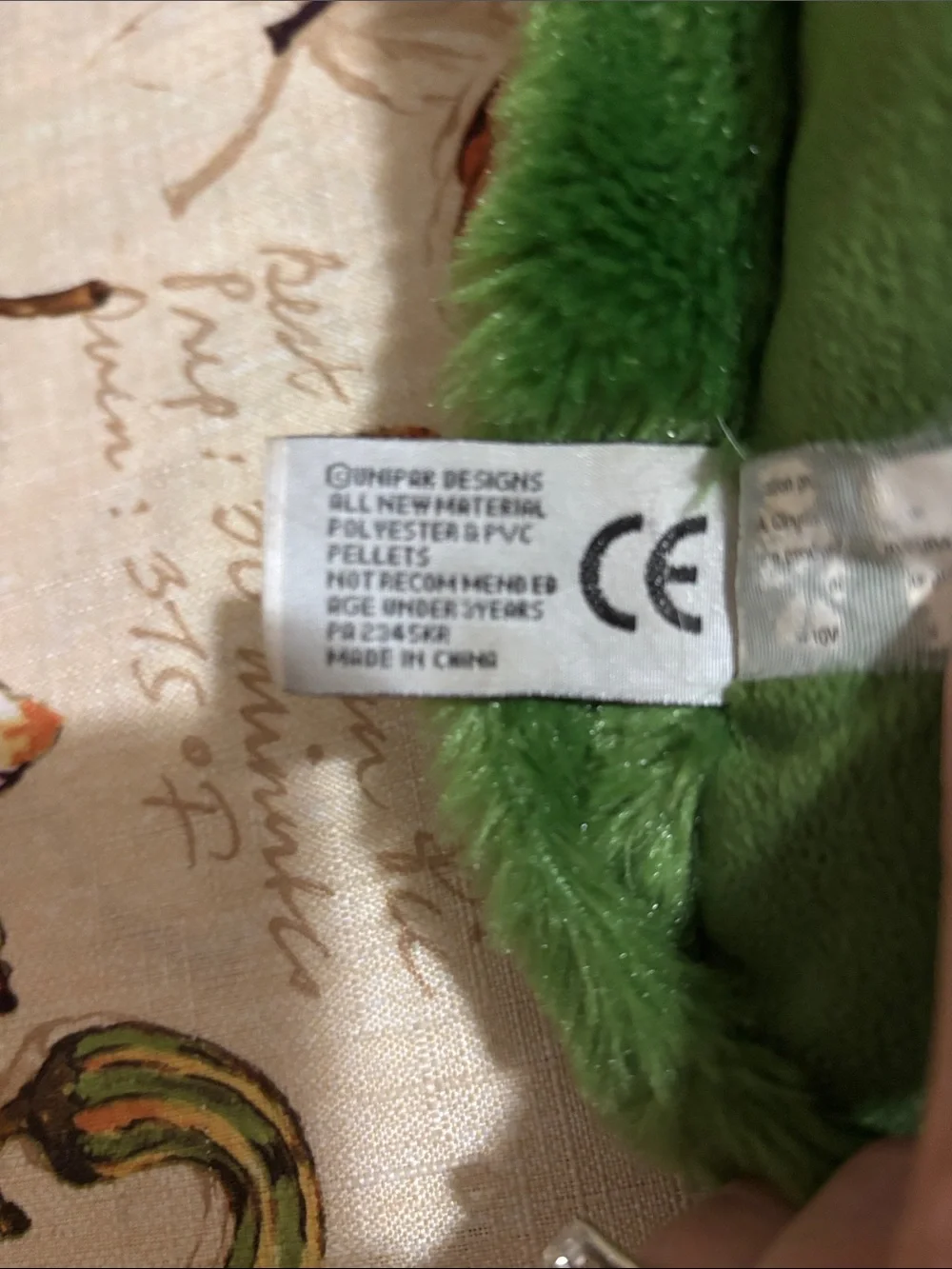 Green Woodland Plush Cushion with Attached Brown Buffalo